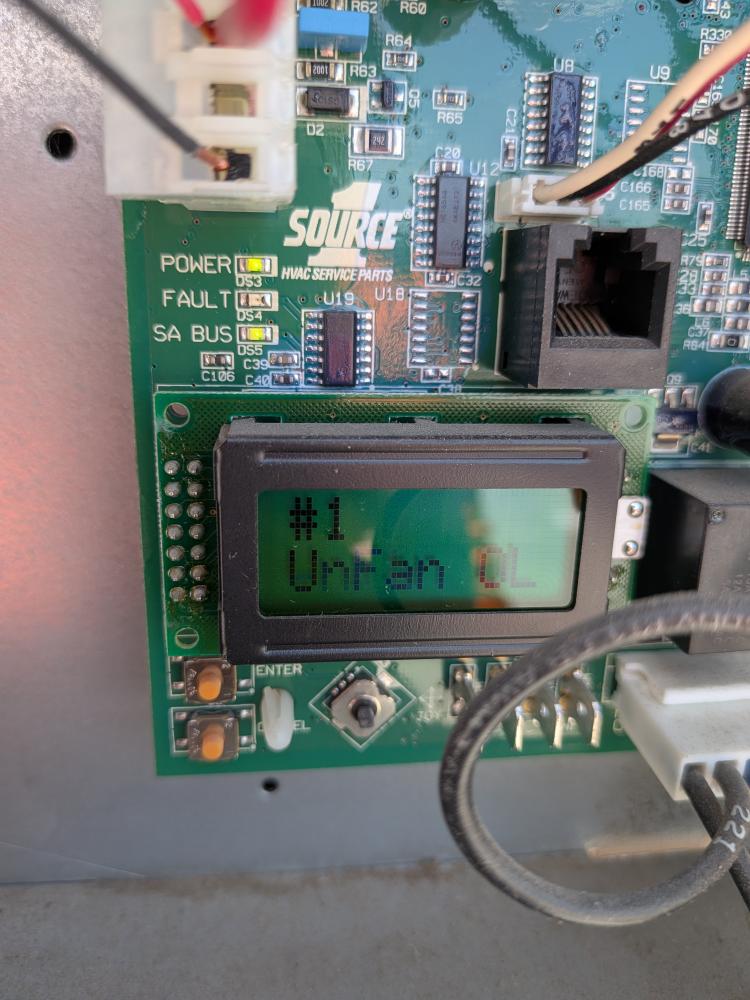 Commercial HVAC control board displaying status message