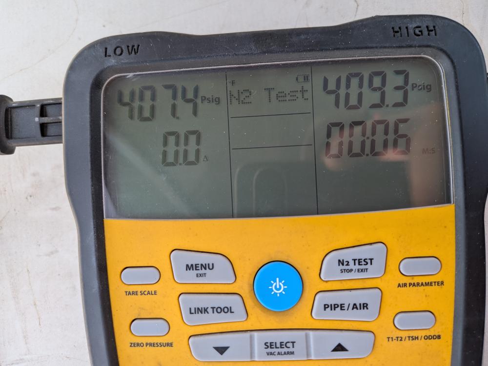 Close view of commercial HVAC nitrogen pressure test readings
