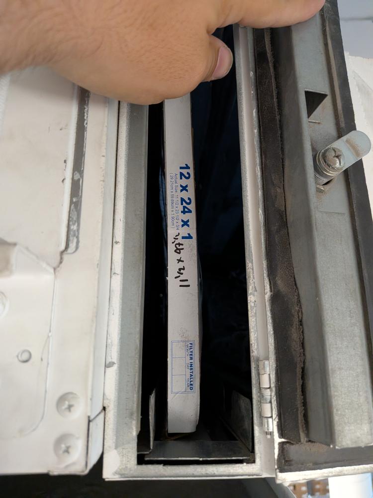 Daikin mini split filter track opened for maintenance
