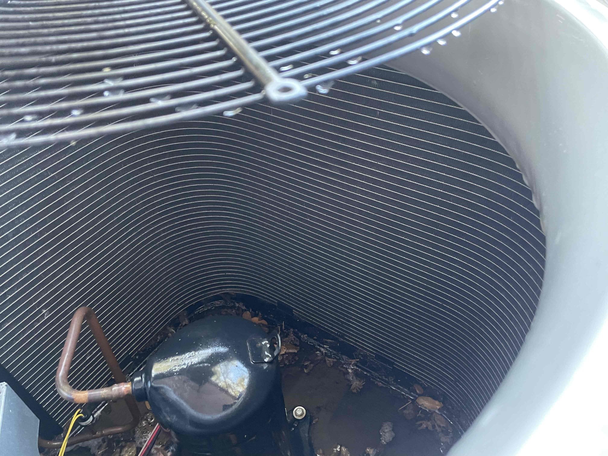 Interior of residential AC condenser cabinet in Cedar Park