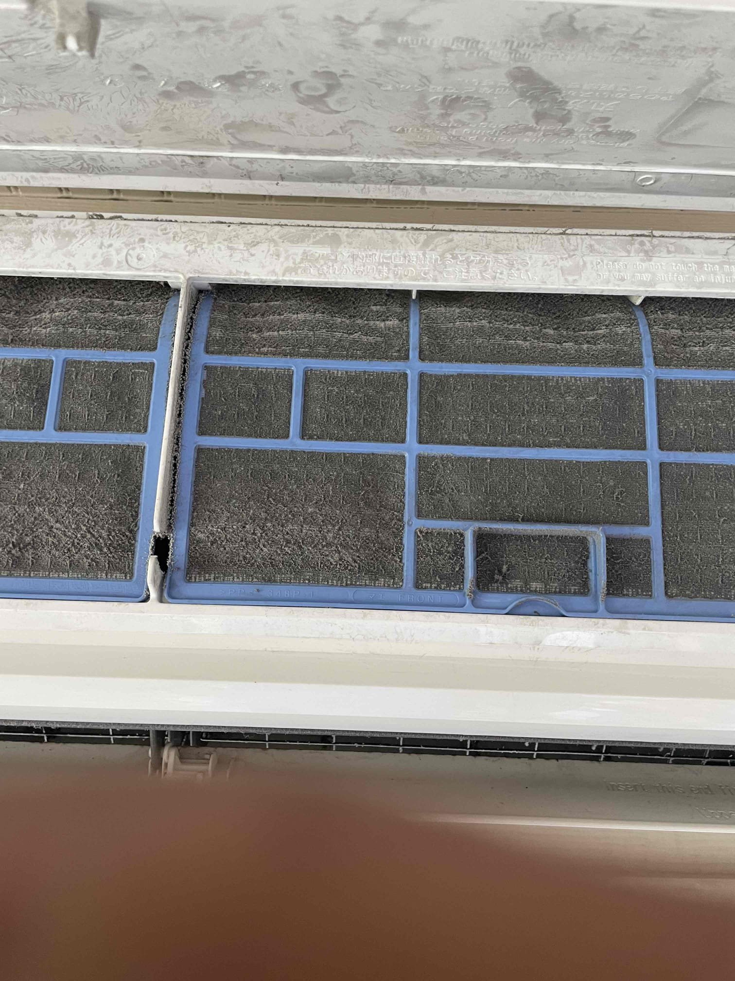 Dust-loaded mini split filters in Cedar Park home