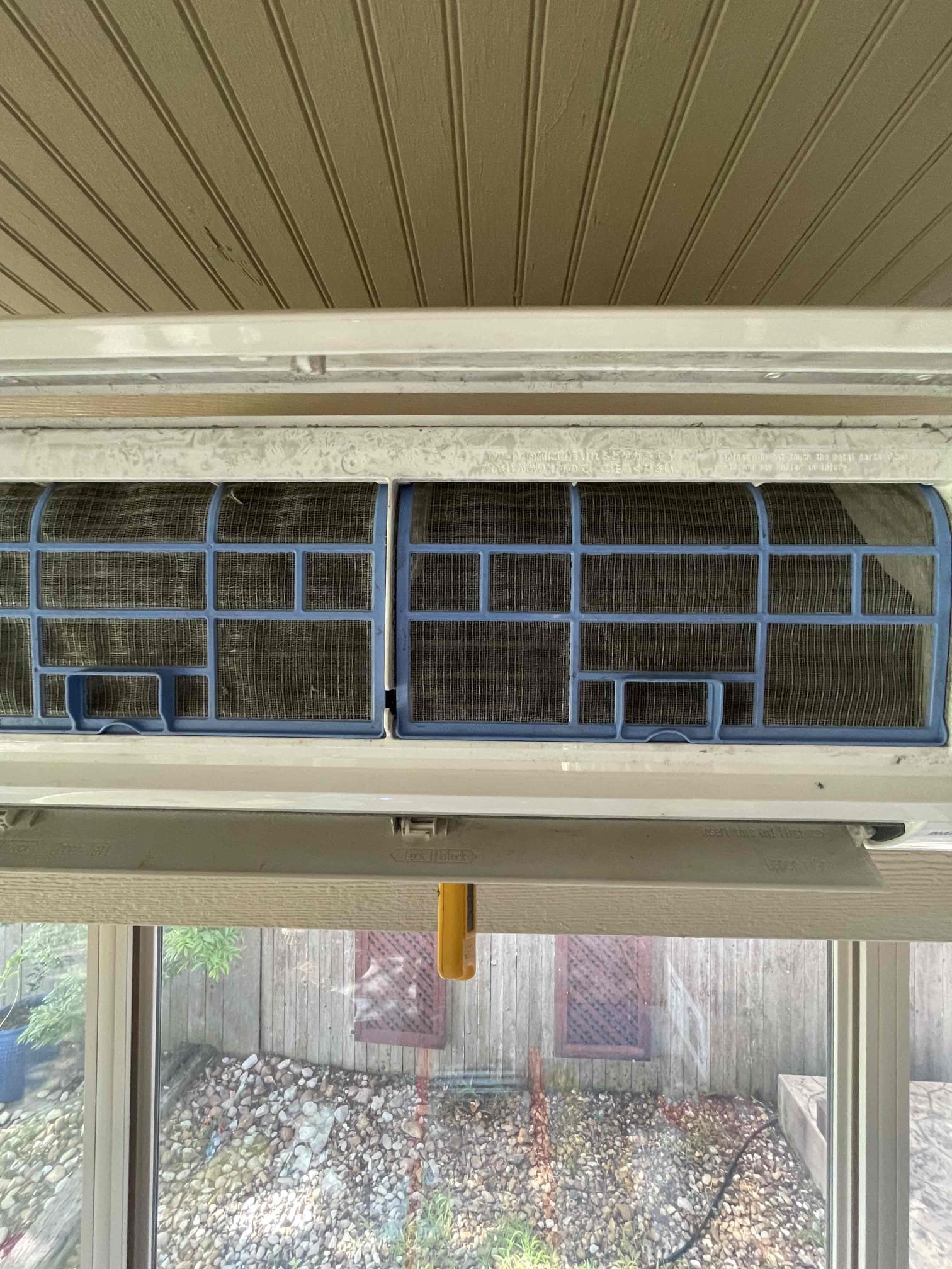 Indoor mini split filter and coil area opened for inspection