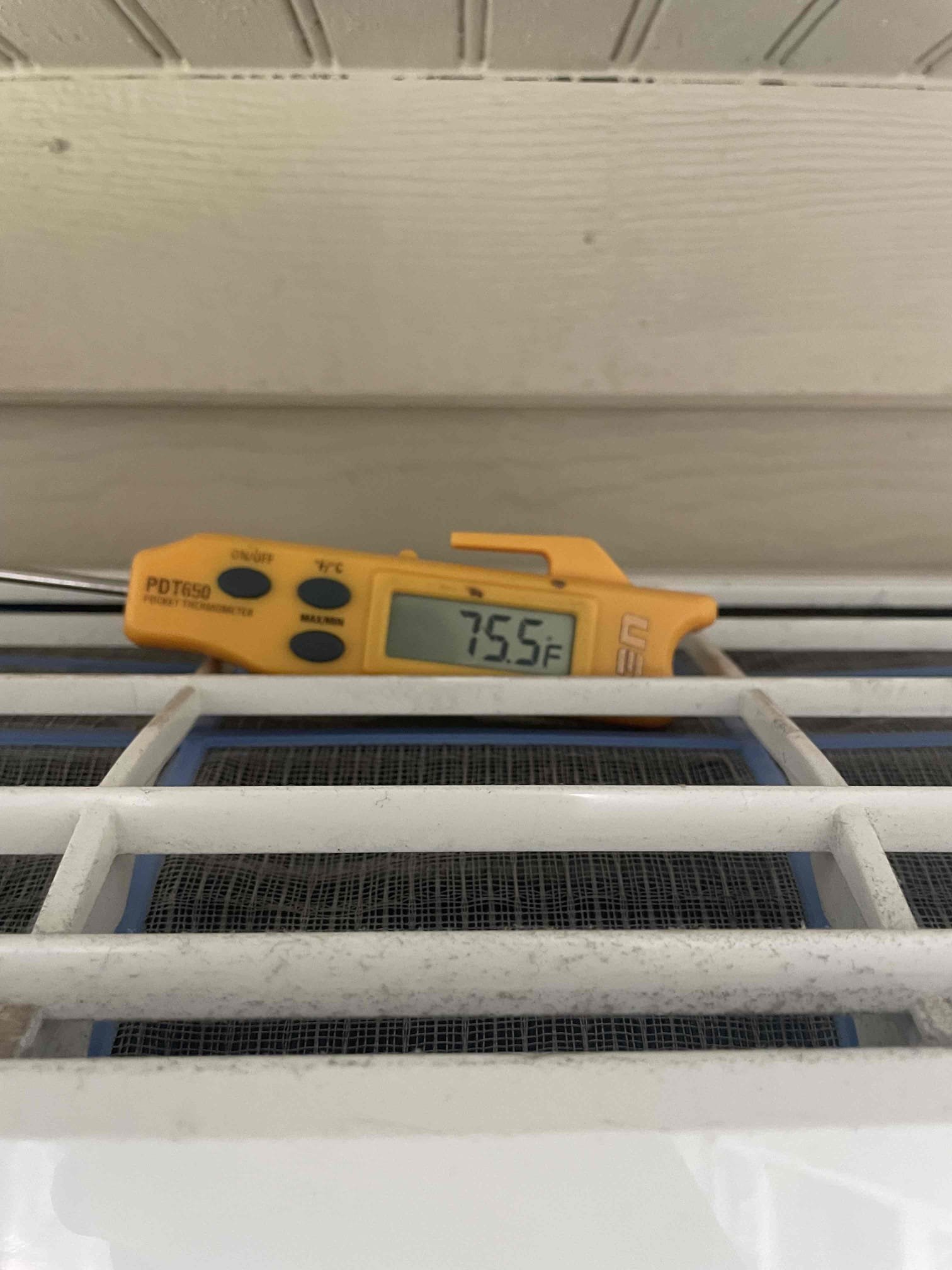 Mini split air temperature probe displaying 75.5 degrees