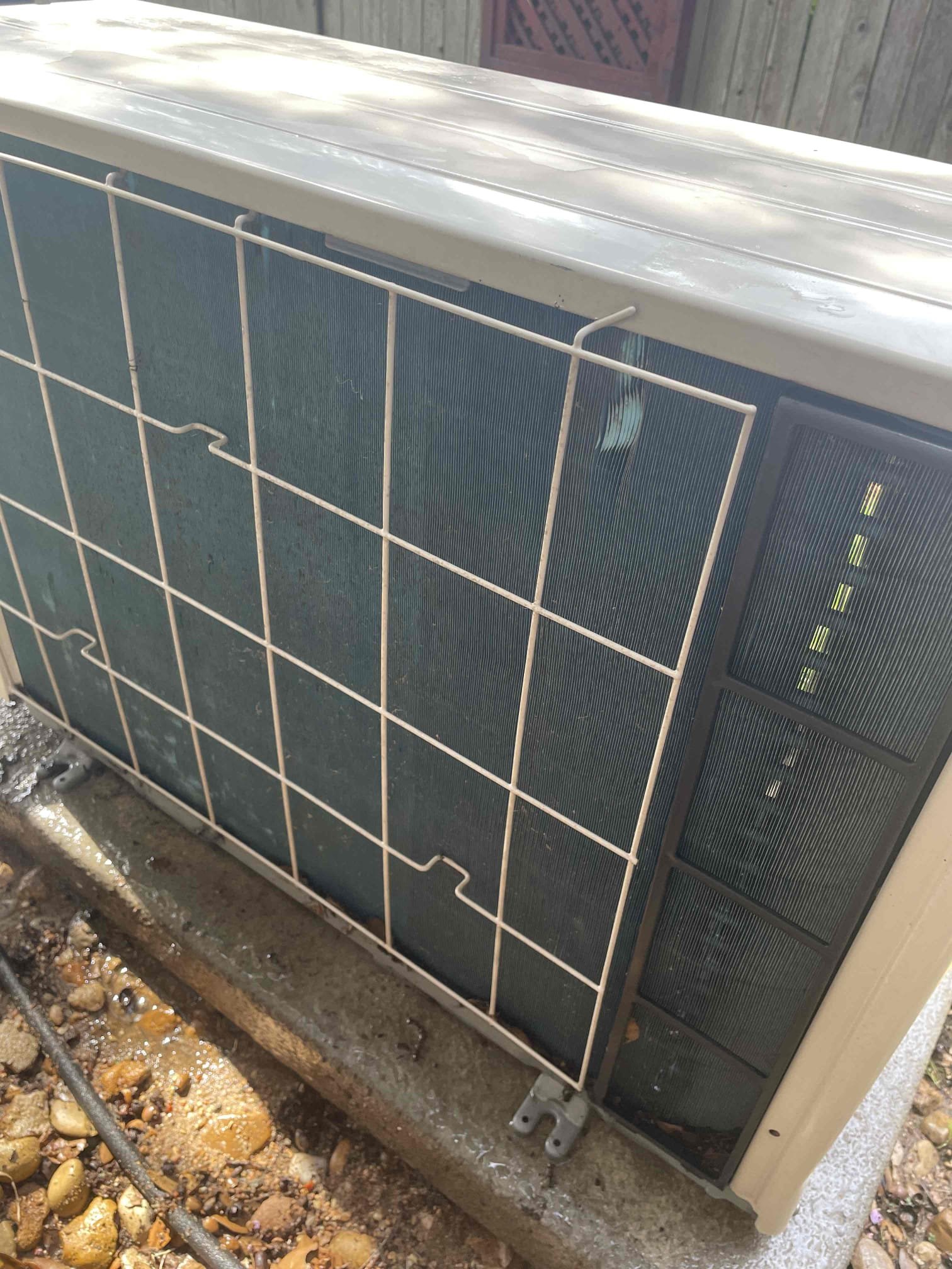 Debris buildup across residential mini split outdoor coil
